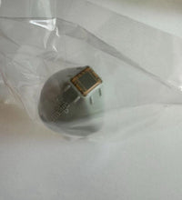 Angled view of Thermage CPT Eye Tip 0.25cm² – 450 Reps in sterile wrap, showing treatment surface and branding.