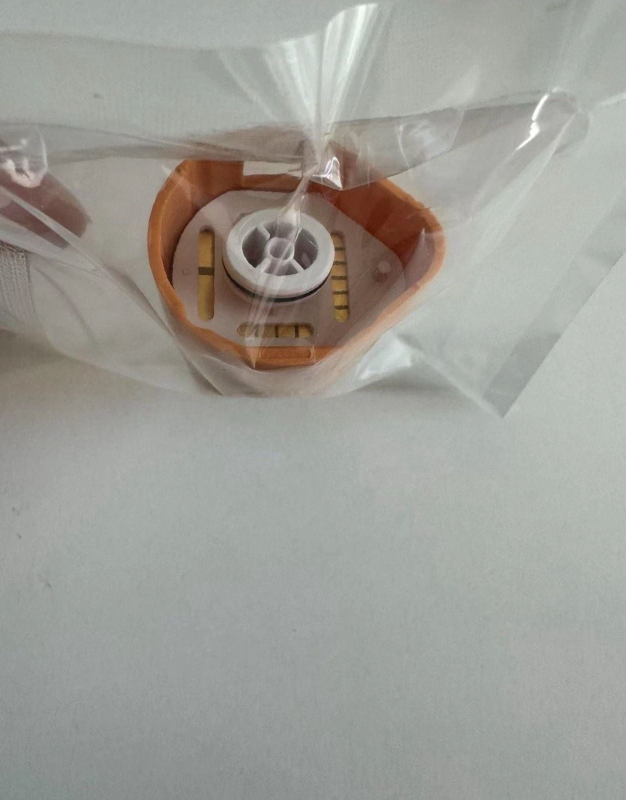 Close-up of Thermage CPT Body Frame Total Tip connector end, sealed in hygienic packaging for safe single-use application.