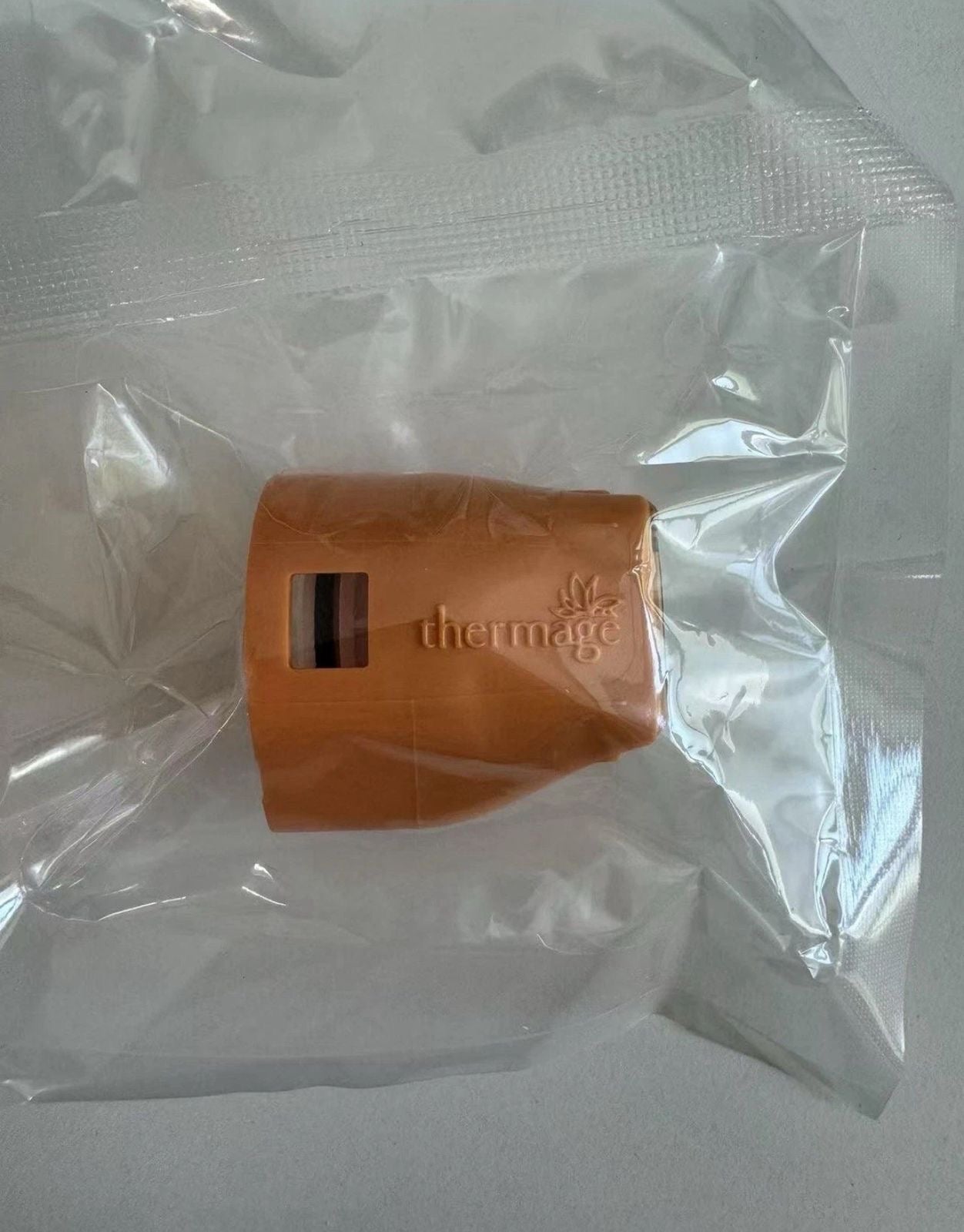 Sealed Thermage CPT Body Frame Total Tip 3.0cm² with embossed logo, ensuring authenticity and hygiene for health care professionals.